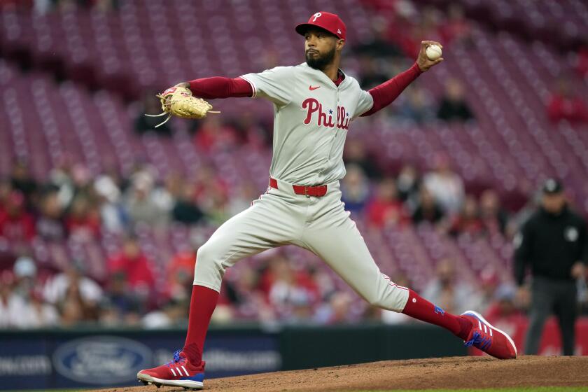 Philadelphia Phillies starting pitcher Cristopher Sánchez throws in the first inning of a baseball game against the Cincinnati Reds on Tuesday, April 23, 2024, in Cincinnati. (AP Photo/Carolyn Kaster)