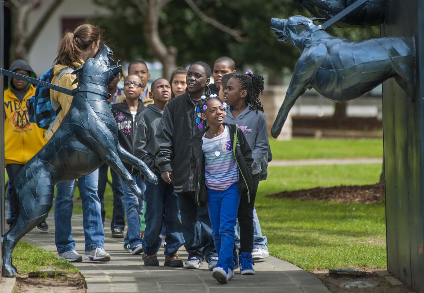 Schoolchildren visit Kelly Ingram Park in Birmingham, Ala., which is embracing its civil rights legacy. The park is the site of statues and sculptures that commemorate and, in some cases, depict the civil rights movement and the city's notorious response: police dogs, fire hoses, jail time.