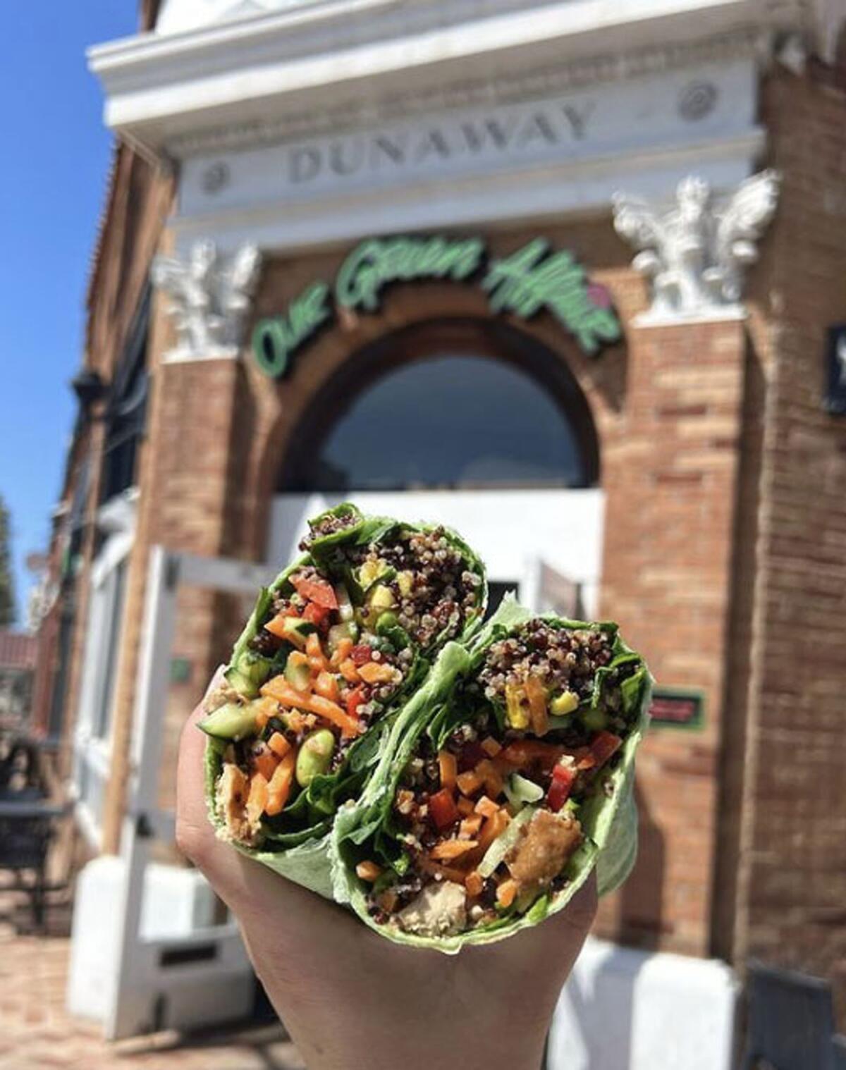 The Hot Chick wrap at Our Green Affair has a base of spinach and quinoa.