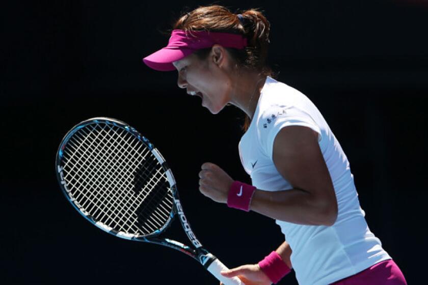 Li Na celebrates a point during her semifinal victory over Eugenie Bouchard at the Australian Open on Thursday.