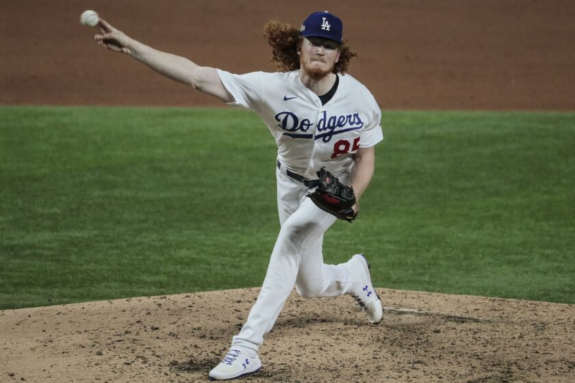 Arlington, Texas, Tuesday, October 6, 2020. Los Angeles Dodgers starting pitcher Dustin May (85) pitches.