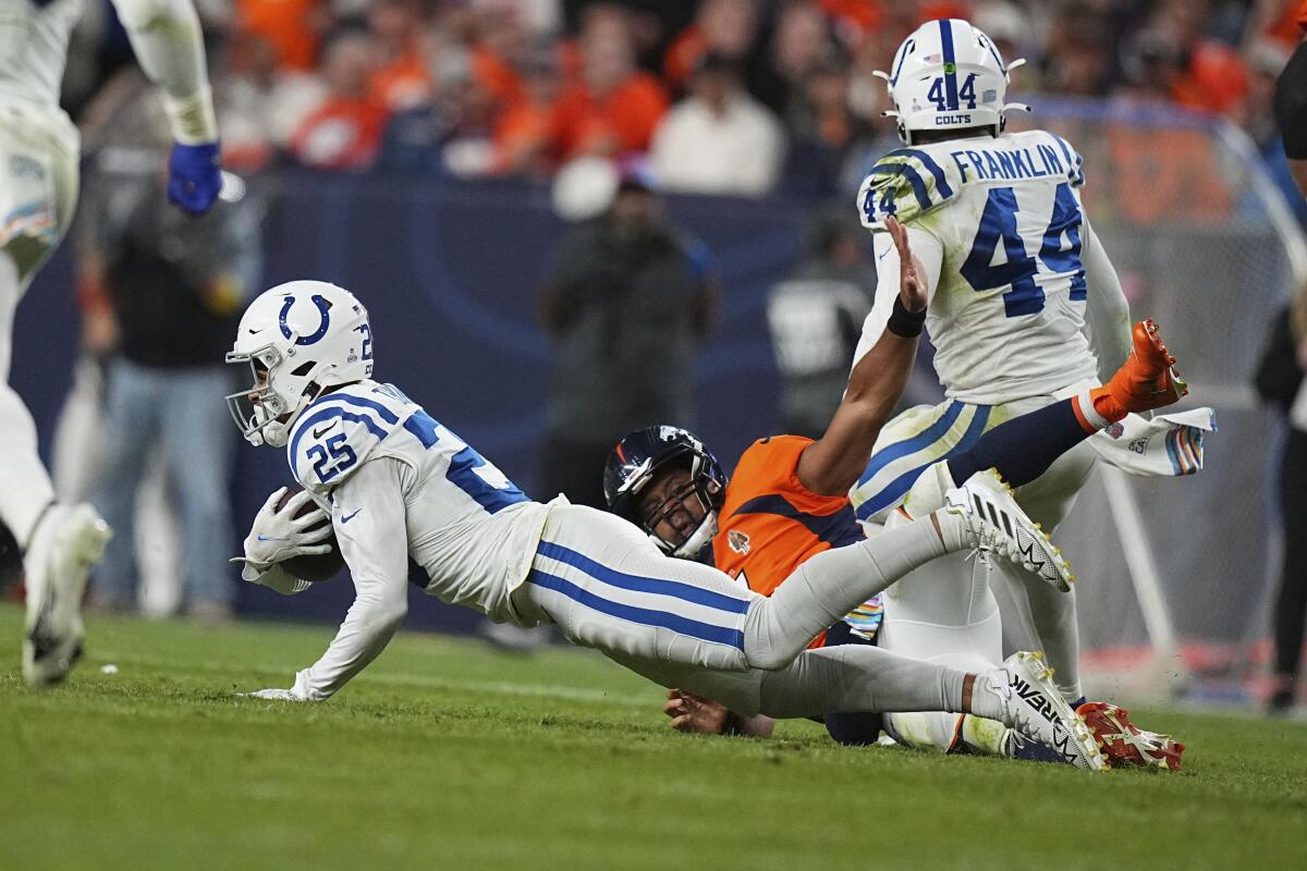 Indianapolis Colts safety Rodney Thomas II intercepts the ball against the Denver Broncos.