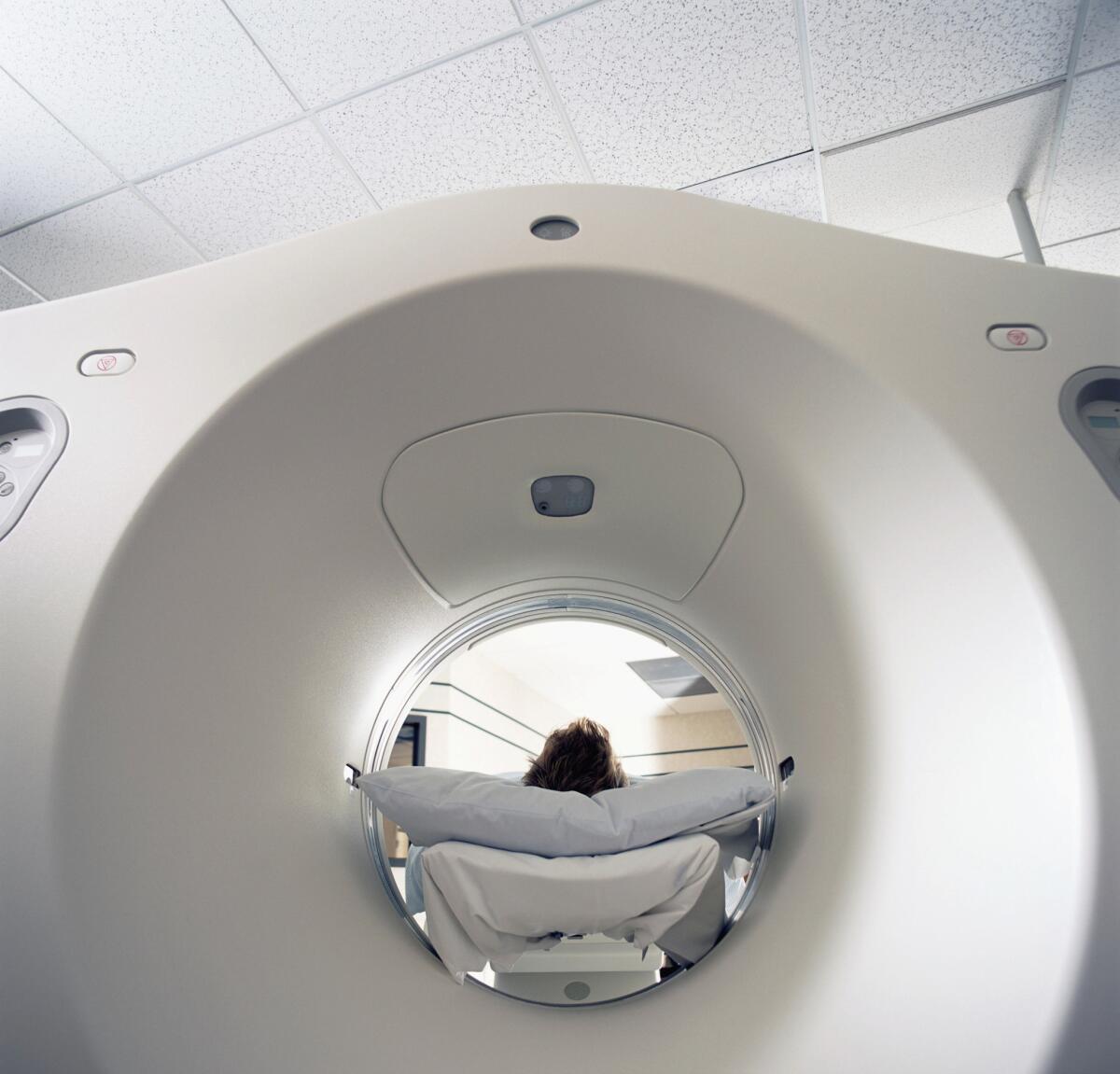 A patient lies in a MRI scanner in this file photo.
