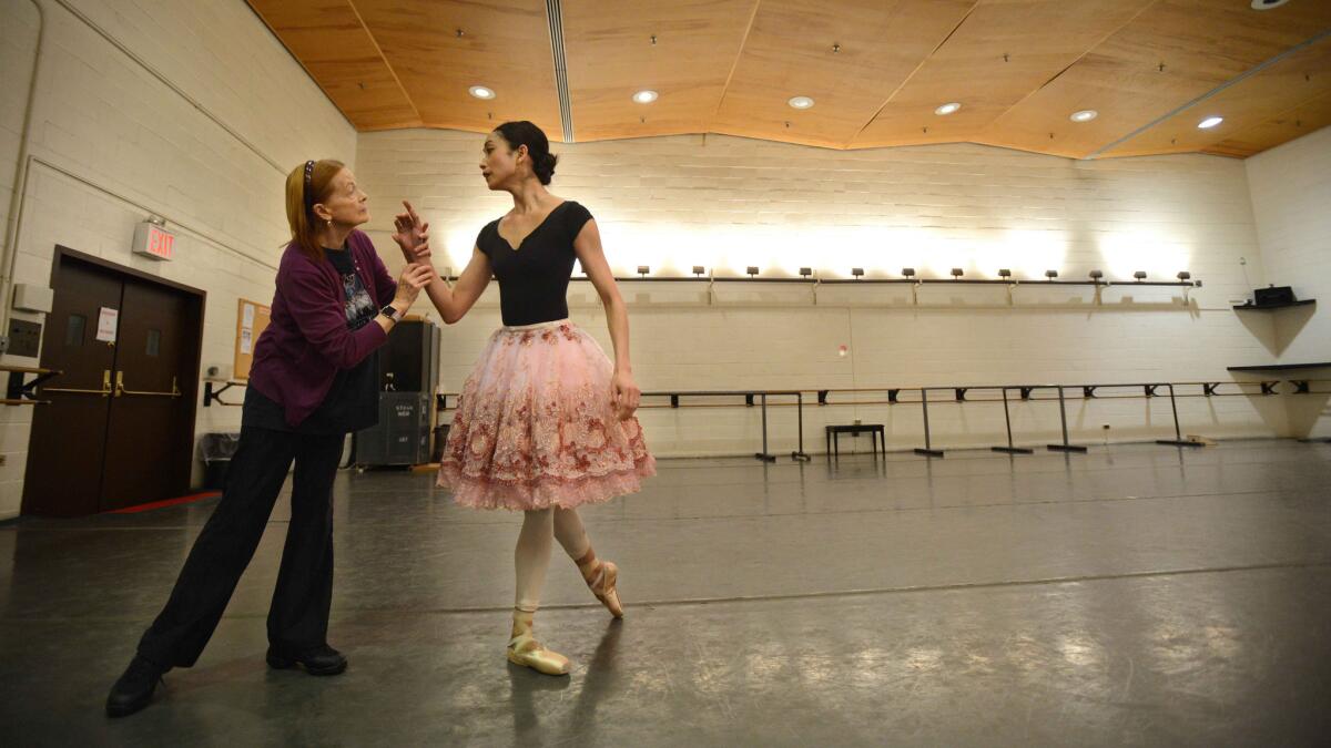 Ballet mistress Irina Kolpakova, left, coaches Stella Abrera during a recent rehearsal in New York.