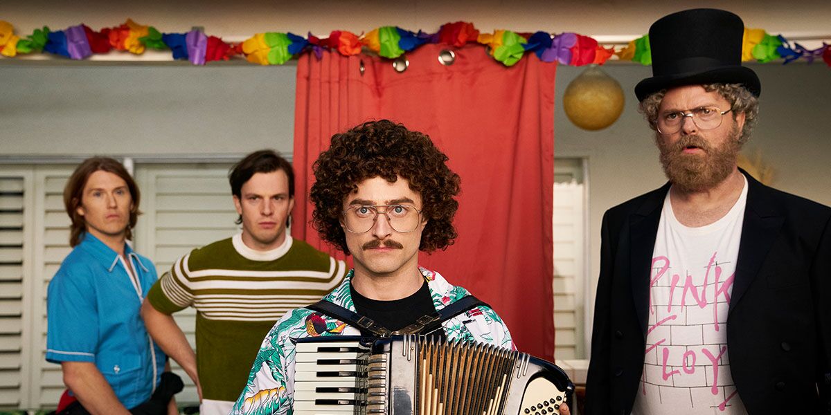 Daniel Radcliffe, center, and Rainn Wilson, right, in "Weird: The Al Yankovic Story"