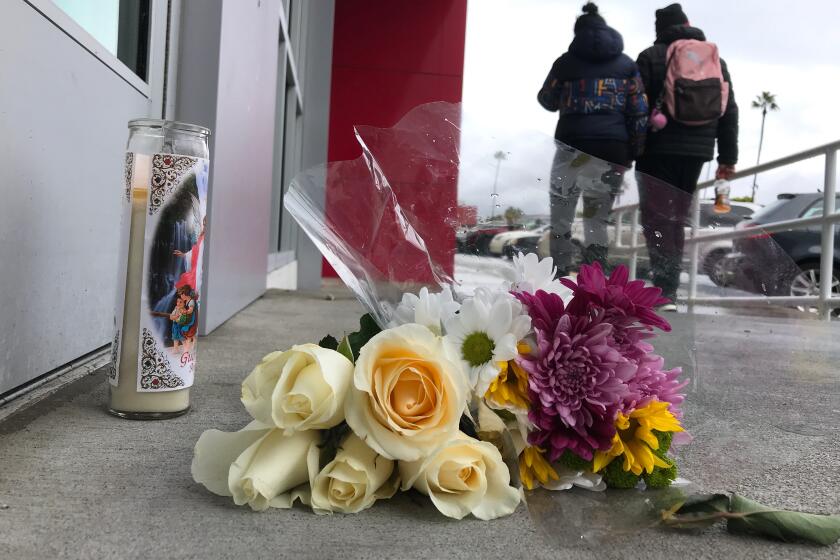 A memorial at the Burlington store in North Hollywood where a 14-year-old was shot and killed.