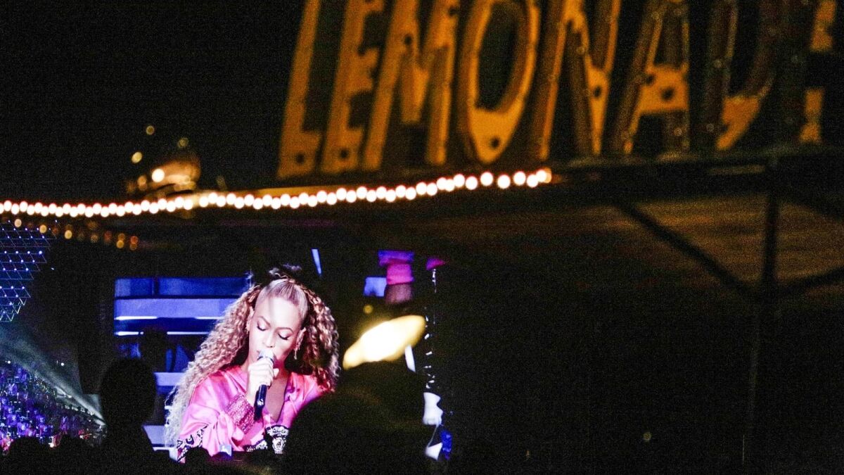 Beyoncé began her Week 2 performance at Coachella on Saturday with songs from her album "Lemonade."