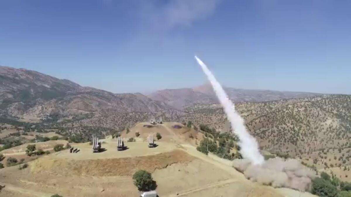 This image taken from video footage provided by Iranian military on Thursday, Sept. 29, 2022, a missile is launched during an attack targetting the Iraqi Kurdish region. Iran's powerful Revolutionary Guard has since Monday unleashed a wave of drone and artillery strikes targeting what Tehran says are bases of Iranian Kurdish separatists in northern Iraq. (Iranian military via AP)
