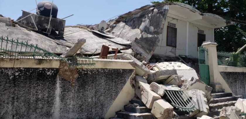 A residence is partially collapsed