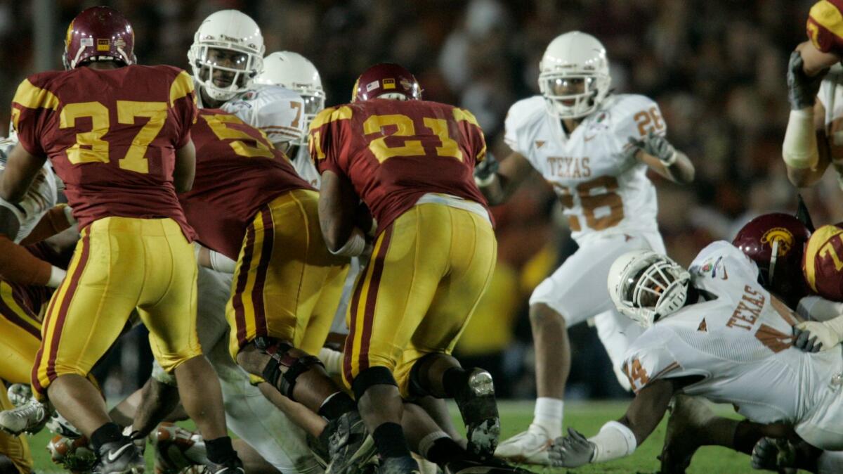 The Texas defense stops USC's LenDale White on fourth and two.