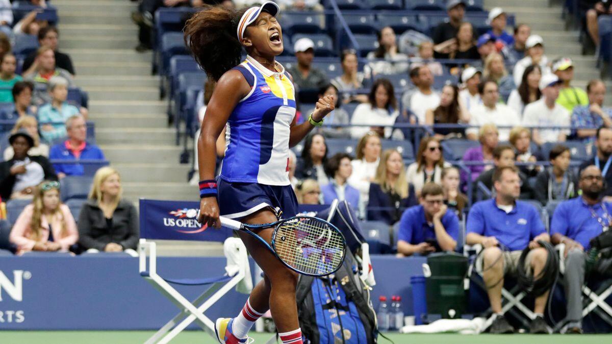 Naomi Osaka reacts after winning a point against Angelique Kerber during the first round of the U.S. Open on Tuesday.