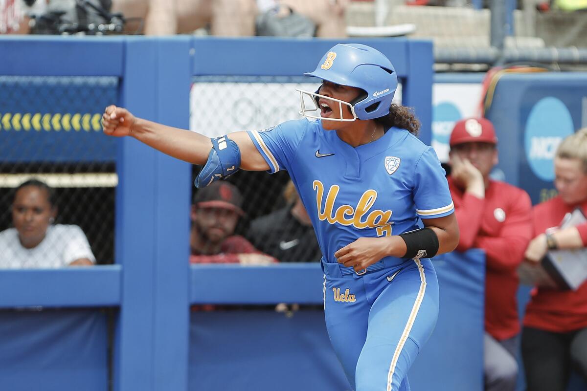 UCLA's Maya Brady celebrates after hitting a home run against Oklahoma in the Women's College World Series.