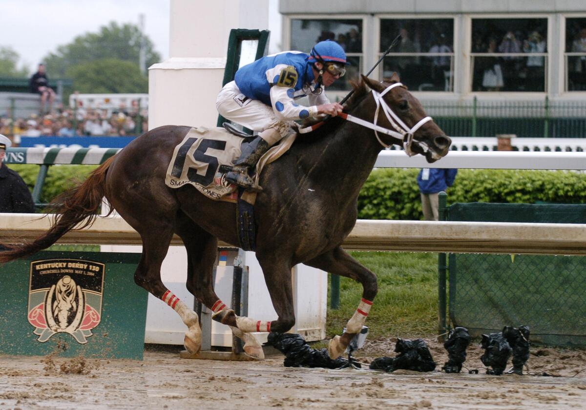 Jockey Stewart Elliott rides Smarty Jones to victory at the Kentucky Derby on May 1, 2004.