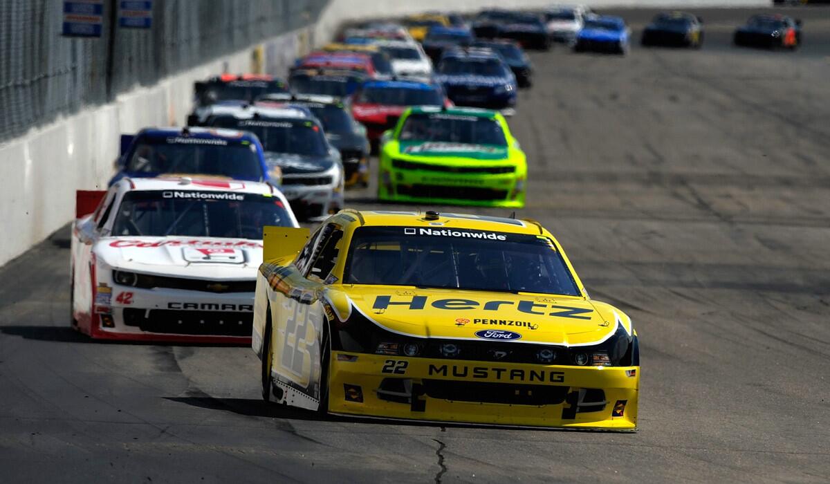 Brad Keselowski, driving the No. 22 Hertz Ford, leads a pack of cars during the NASCAR Nationwide Series Sta-Green 200 at New Hampshire Motor Speedway on Saturday.