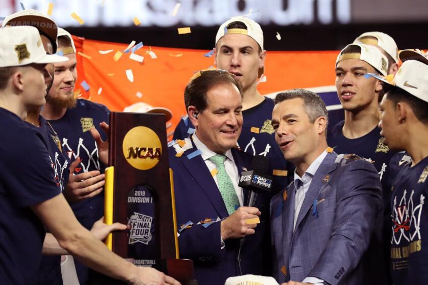 MINNEAPOLIS, MINNESOTA - APRIL 08: Head coach Tony Bennett of the Virginia Cavaliers is interviewed by Jim Nantz after his teams 85-77 win over the Texas Tech Red Raiders to win the 2019 NCAA men's Final Four National Championship game at U.S. Bank Stadium on April 08, 2019 in Minneapolis, Minnesota. (Photo by Streeter Lecka/Getty Images) ** OUTS - ELSENT, FPG, CM - OUTS * NM, PH, VA if sourced by CT, LA or MoD **