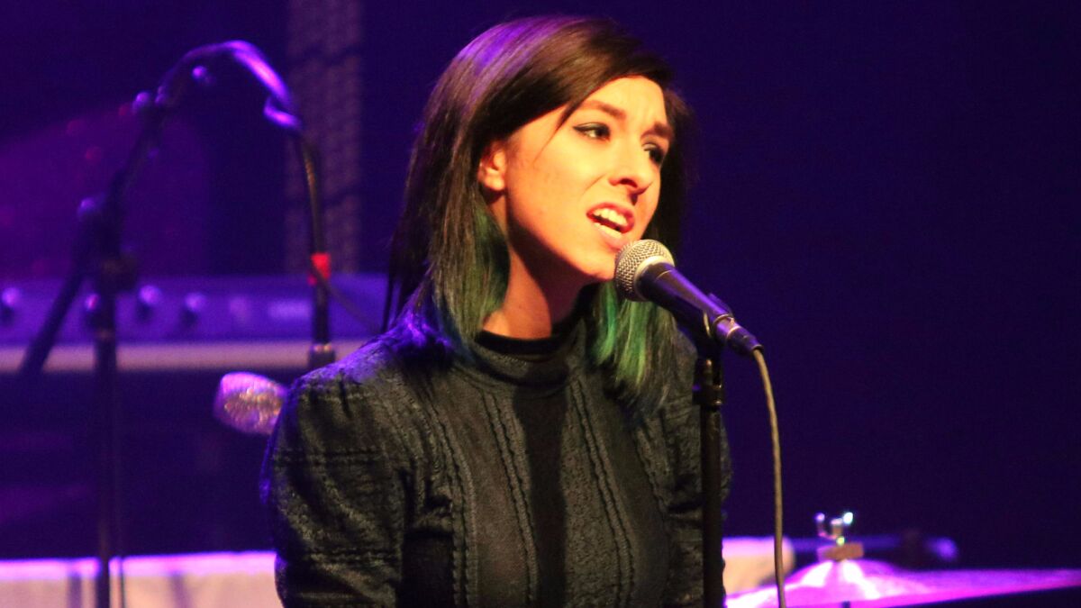 Christina Grimmie performs in March as the opener for Rachel Platten at Center Stage Theater in Atlanta. The former contestant on "The Voice" was killed by a gunman Friday after a concert in Orlando, Fla.