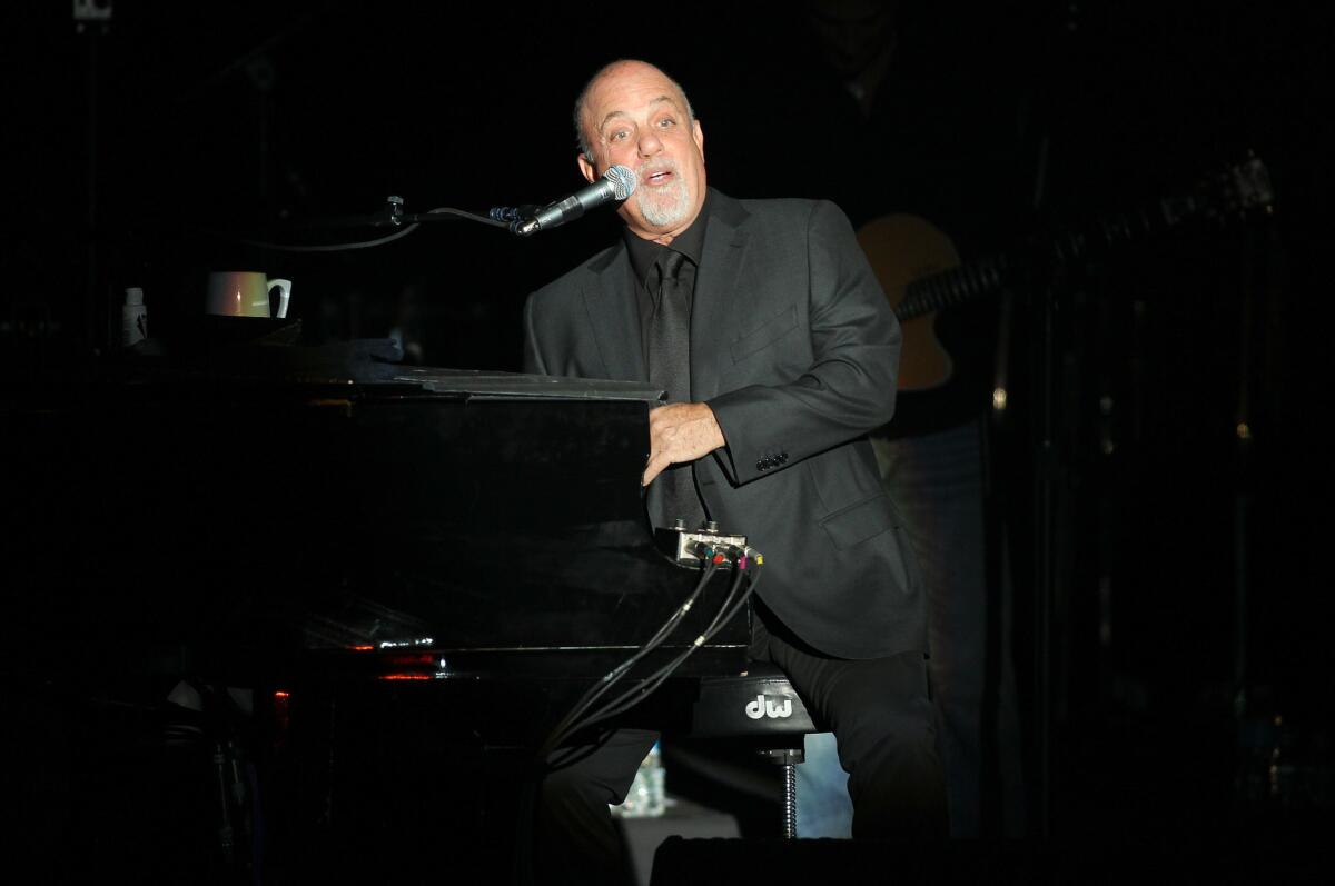 Billy Joel, shown at a recent performance in Huntington, N.Y., is set to perform at the Hollywood Bowl for the first time on May 17. Tickets go on sale Dec. 13.