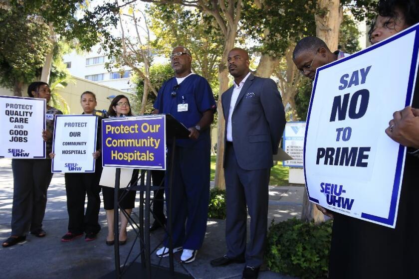 Union leaders are protesting the sale of six hospitals to Prime Healthcare Services Inc. Above, workers speak out at St. Vincent Medical Center in August.