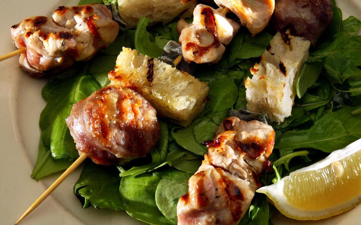 Sausage, chicken and bread skewers