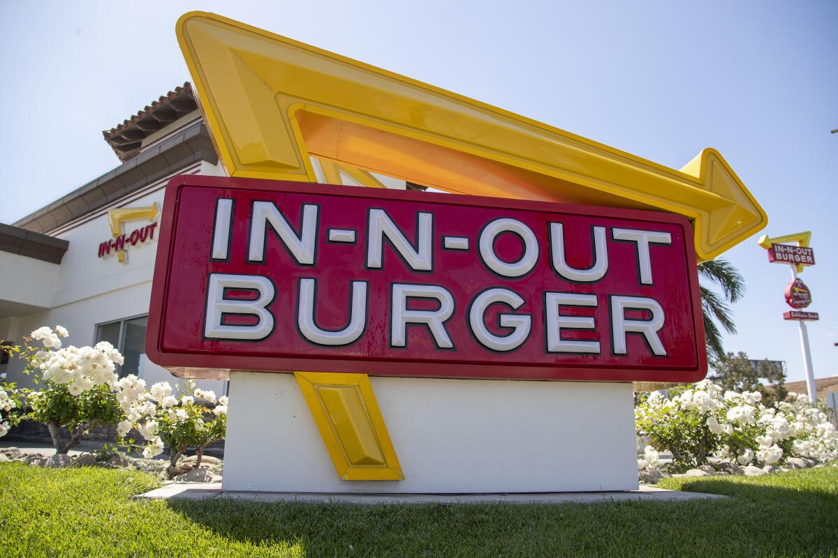 A sign for In-N-Out Burger outside the drive-through restaurant