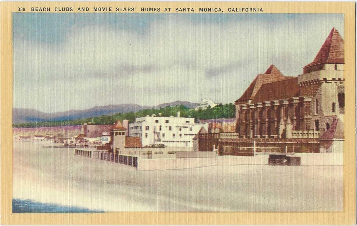 Large homes and the imposing facade of a beach club are seen on the Santa Monica shoreline