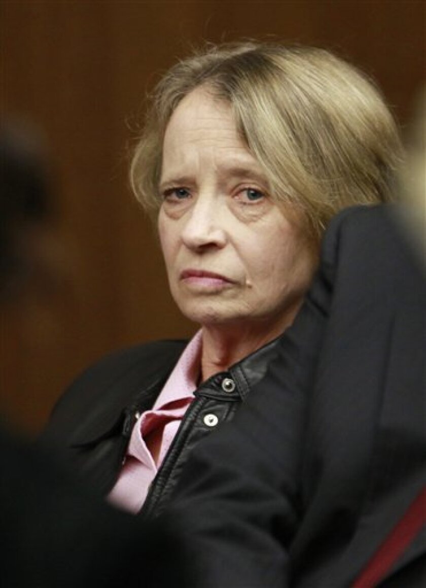 FILE - In this April 5, 2010 file photo, former San Francisco lab technician Deborah Madden appears for her arraignment for drug possession in South San Francisco. Forensics experts say Madden is not the first crime lab worker suspected of stealing drugs or other illegality, and San Francisco's lab joins several other cities in suffering a loss of credibility. (AP Photo/Paul Sakuma, file)