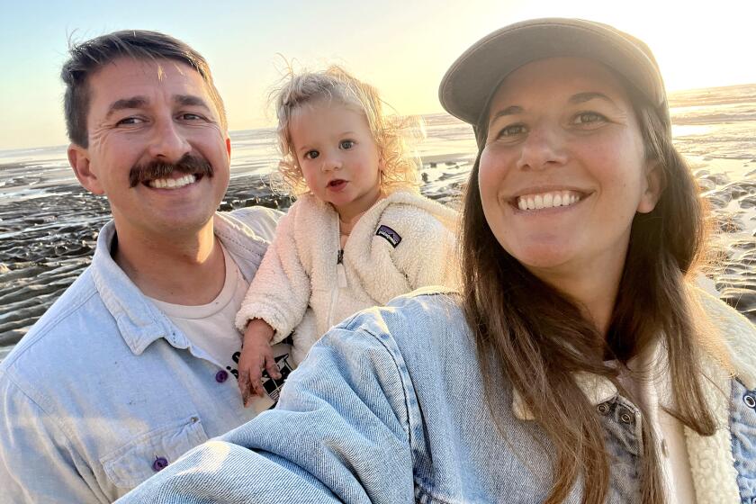 Kellie Shay Hinze, her husband Nick Sadrpour and daughter Lakie Shay Sadrpour enjoy Moonlight Beach in mid-January.