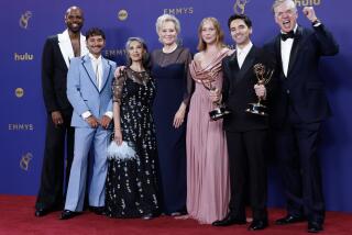 LOS ANGELES, CA - September 15, 2024 - (L-R) Carl Clemons-Hopkins, Mark Indelicato, Rose Abdoo, Jean Smart, Hannah Einbinder, Paul W. Downs and Christopher McDonald, winners of the Outstanding Comedy Series award for "Hacks" in the trophy room at the 76th Primetime Emmy Awards at the Peacock Theater on Sunday, September 15, 2024 (Jason Almond / Los Angeles Times)