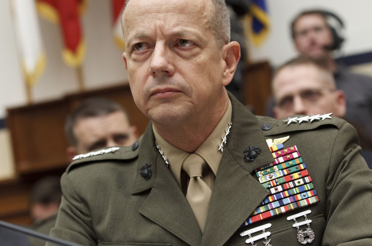 FILE - Marine Gen. John Allen, the top U.S. commander in Afghanistan, testifies on Capitol Hill in Washington on March 20, 2012. The Justice Department has dropped its probe of Allen, a retired four-star general, for his role in an alleged illegal foreign lobbying campaign on behalf of the wealthy Persian Gulf nation of Qatar, according to a statement provided by his attorney on Tuesday, Jan. 31, 2023. (AP Photo/J. Scott Applewhite, File)