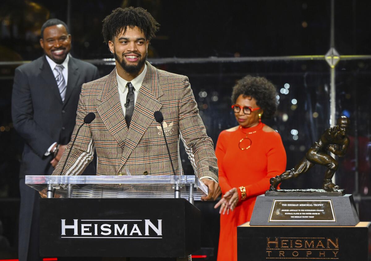 Southern California quarterback Caleb Williams smiles after wining the Heisman Trophy.