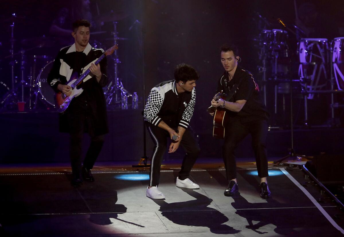 The Jonas Brothers perform.
