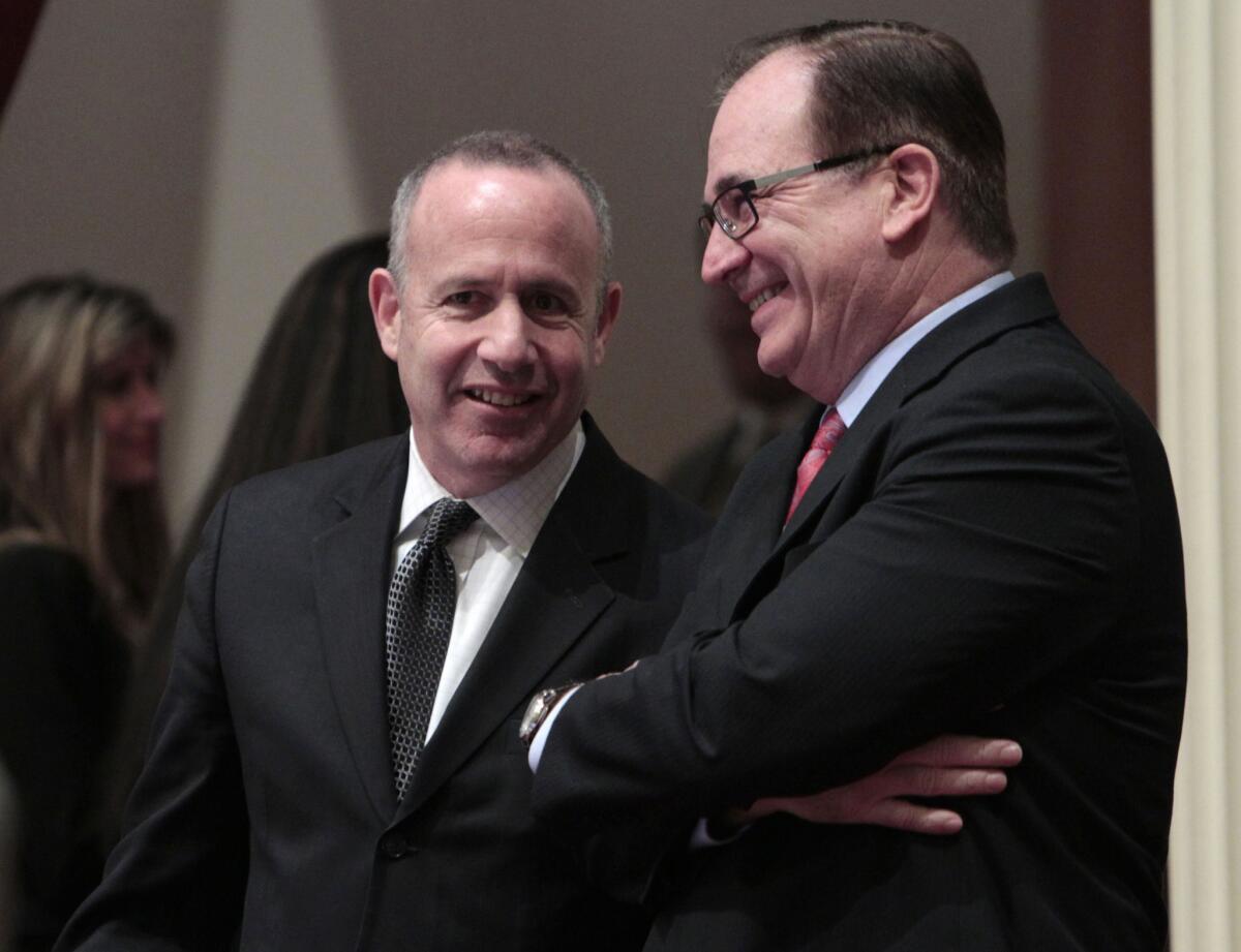 Senate President Pro Tem Darrell Steinberg (D-Sacramento), left, and Senate Minority Leader Bob Huff (R-Diamond Bar) smile as they confer at the Capitol.