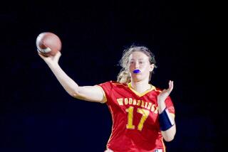 Woodbridge quarterback Teagan Burrus has led her flag football team to an 11-1 record.