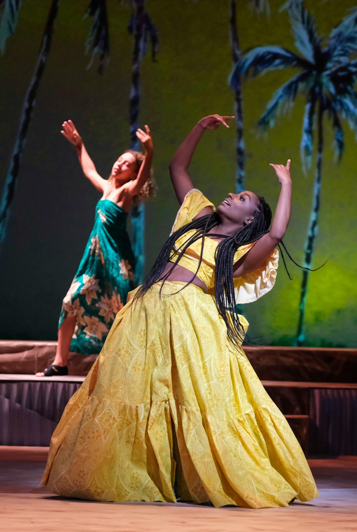 Brooke Henderson, foreground, and Maya Washington dance in "Once on This Island."