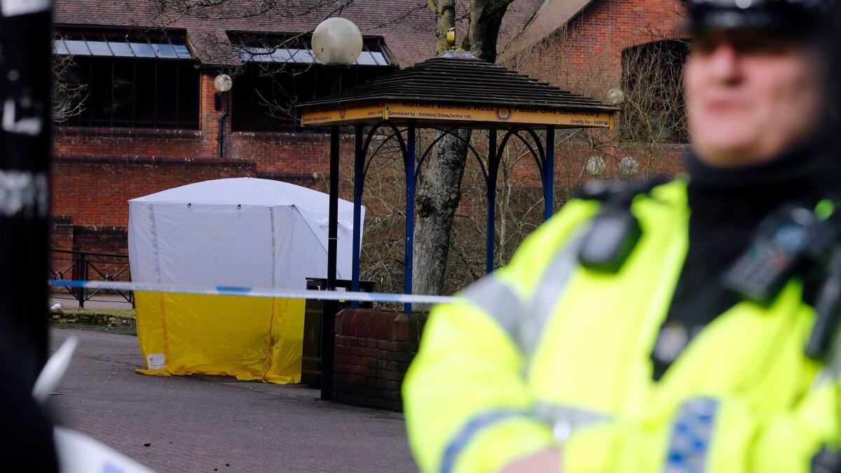 A police tent covers the spot in Salisbury, England, where former Russian spy Sergei Skripal, 66, and his 33-year-old daughter, Yulia, were found unconscious.