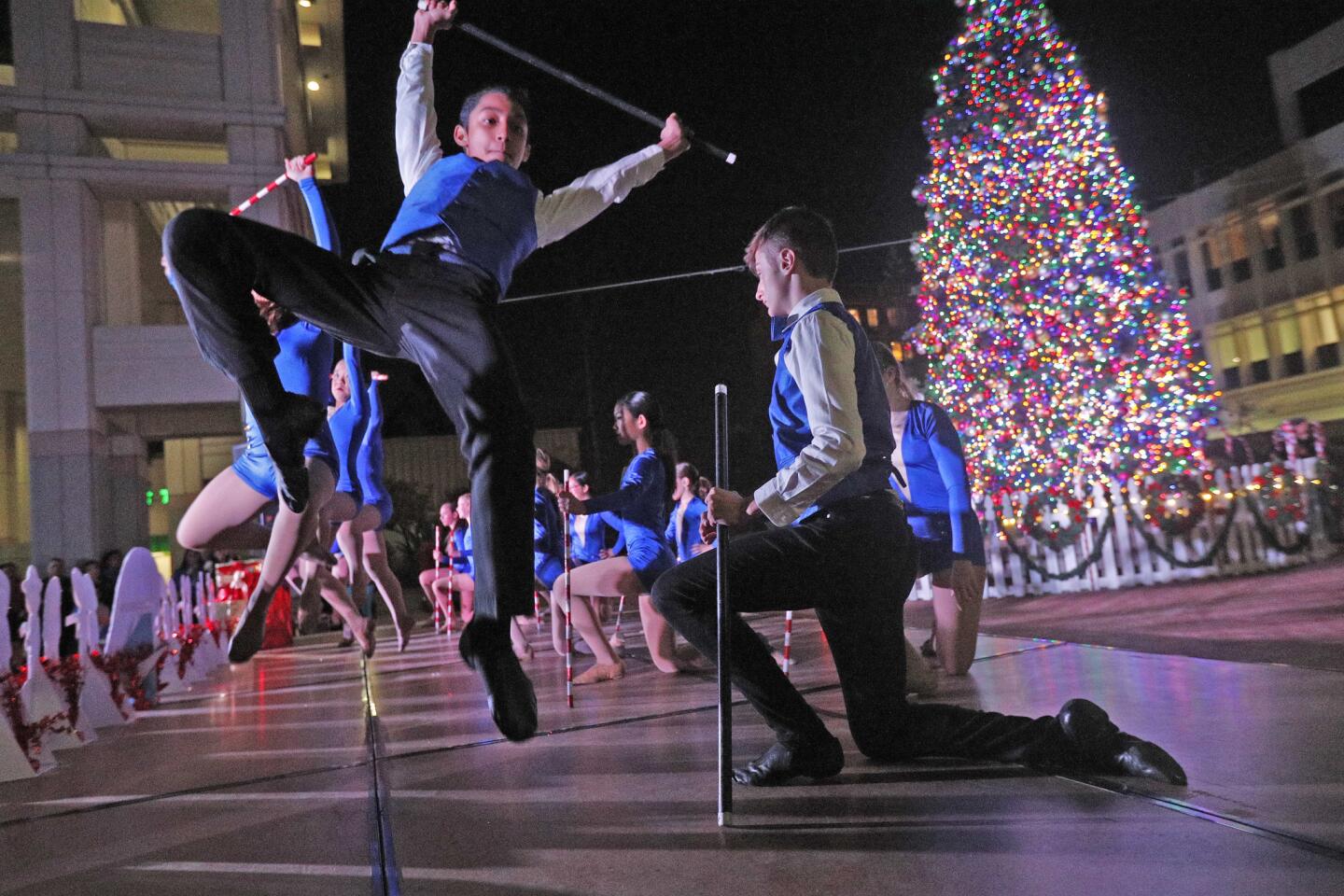 Performers with the Revolution Dance Company, from Montrose, dance at the Holiday Tree Lighting Ceremony and Cram-A-Classic Toy Drive at the Glendale City Hall Perkins Plaza on Monday, December 3, 2018. Santa, a toy drive, and the 1966 holiday classic "How the Grinch Stole Christmas!" were all going on.