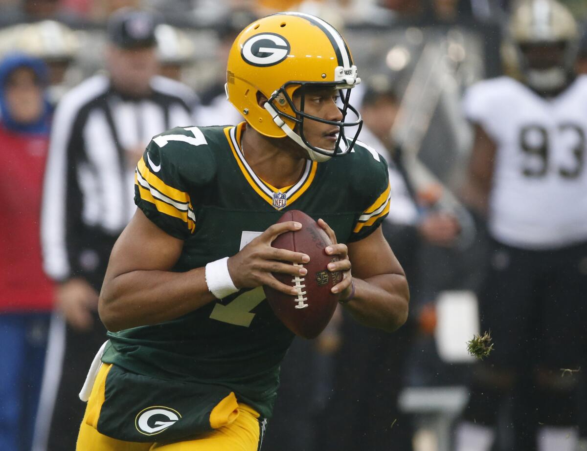 Green Bay Packers quarterback Brett Hundley looks for a receiver during the first half against the New Orleans Saints.