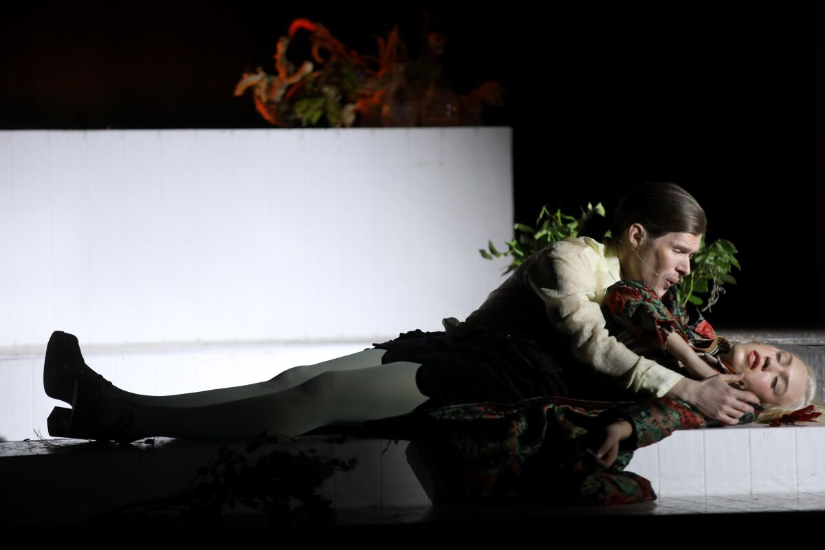 Lucas Steele as The Dreamer and Tivoli Treloar as The Lover in a dress rehearsal of Kate Soper's "Romance of the Rose."