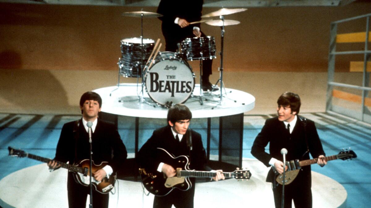 Beatlemania begins: The world changes as The Beatles land in the