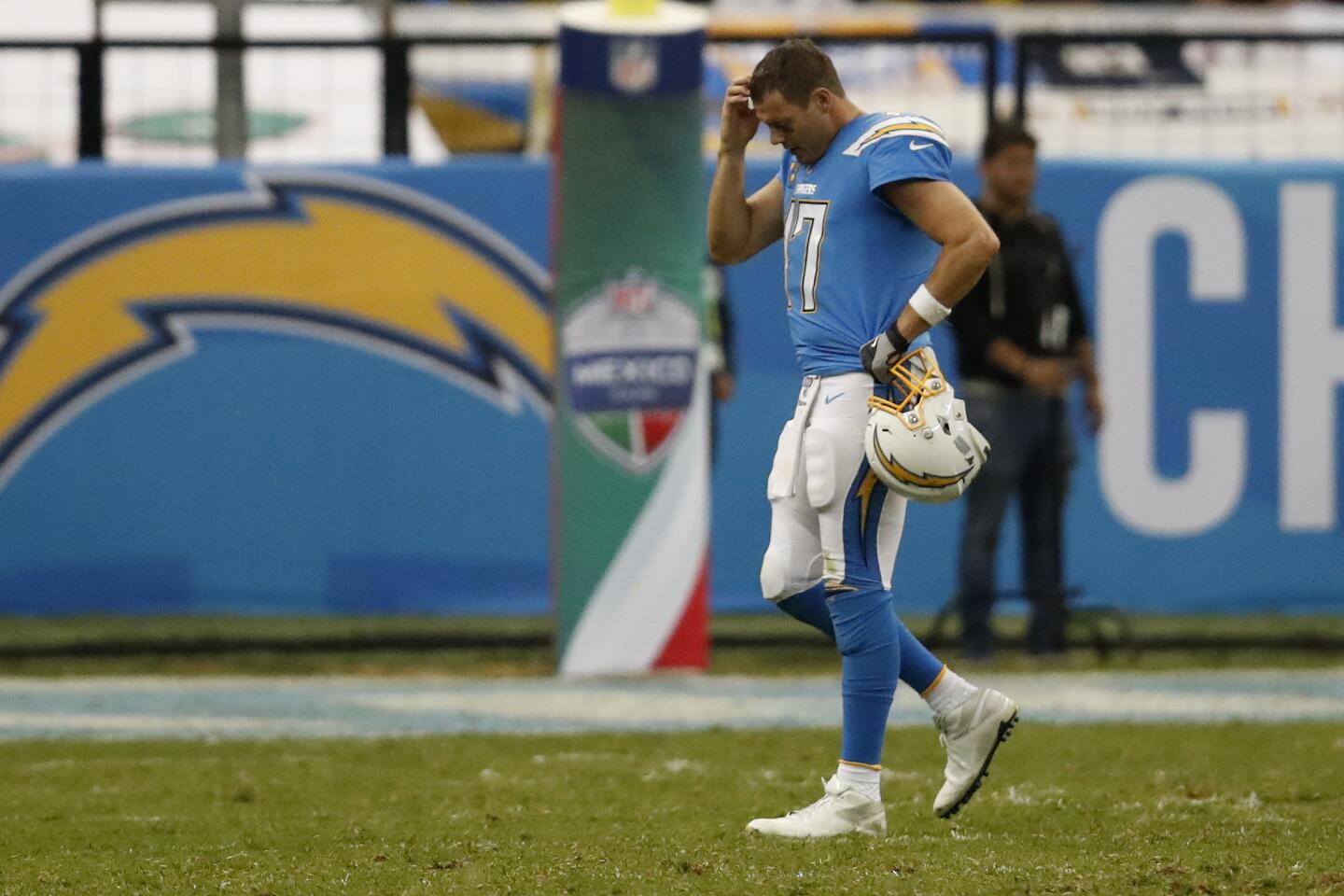 Chargers quarterback Philip Rivers walks off the field during the second half of a game against the Chiefs on Nov. 18.