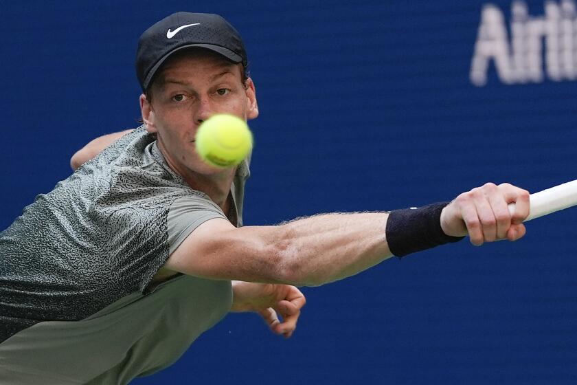 Jannik Sinner, of Italy, returns a shot to Christopher O'Connell, of Australia, during the third round of the U.S. Open tennis championships, Saturday, Aug. 31, 2024, in New York. (AP Photo/Julia Nikhinson)