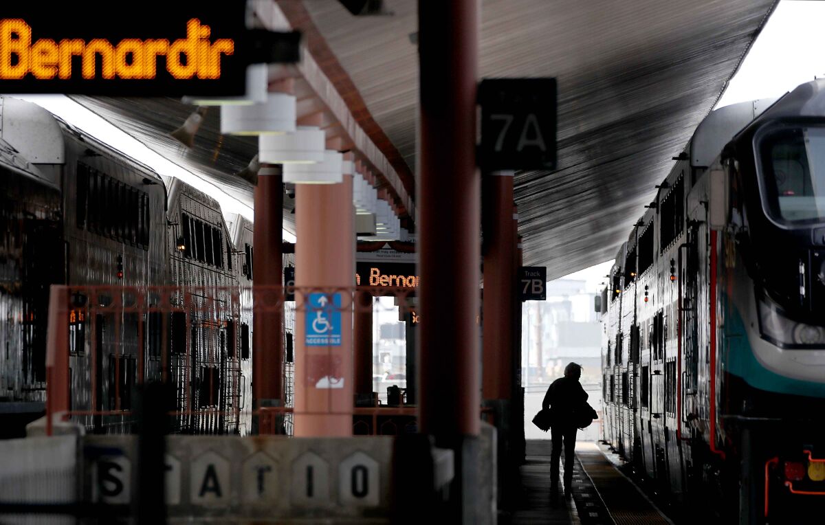 Passengers on a platform to board a Metrolink train at Union Station in downtown Los Angeles on Monday.