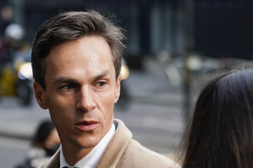 Danish golfer Thorbjorn Olesen arrives at Aldersgate House Crown Court, in London, Monday, Dec. 6, 2021. The five-time European Tour winner was arrested on his return from the World Golf Championships-FedEx St Jude Invitational on a flight from Nashville to London on July 29, 2019, accused of sexual assault, being drunk on an aircraft and assault by beating. (AP Photo/Alberto Pezzali)