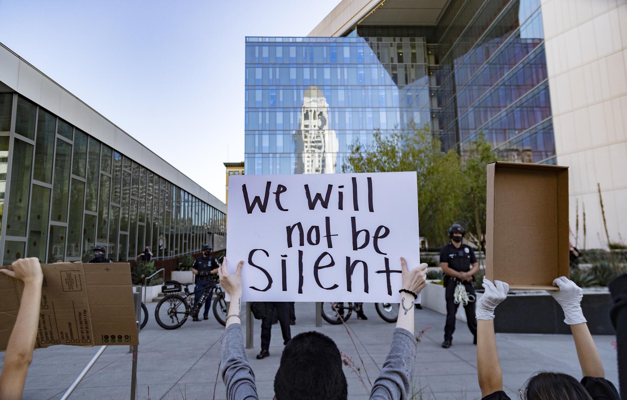 Protesters with Black Lives Matter rally outside Los Angeles Police Department headquarters in May.