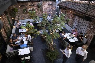 WESTWOOD, CA - JUNE 12: The courtyard is the most popular dining area at Violet. The Westwood restaurant and cooking school is preparing to reopen fully on June 15. Photographed on Saturday, June 12, 2021 in Westwood, CA. (Myung J. Chun / Los Angeles Times)