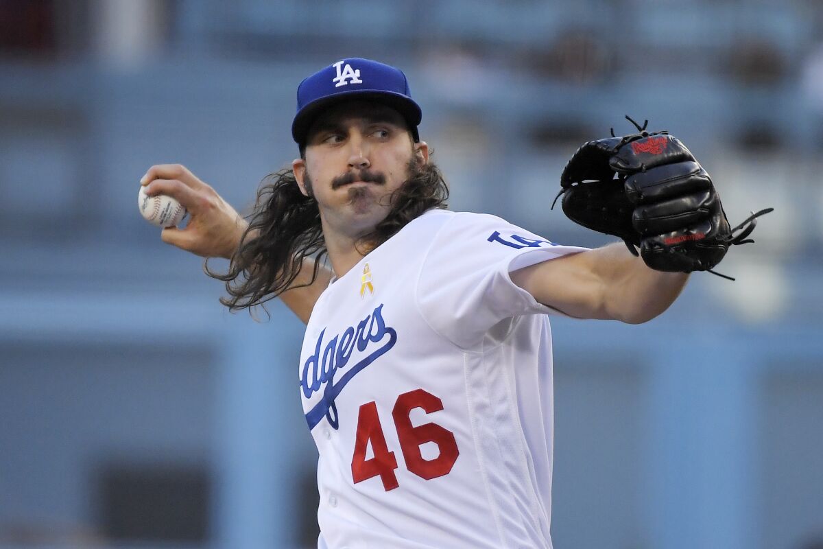 Dodgers pitcher Tony Gonsolin throws against the Giants on Sept. 7.
