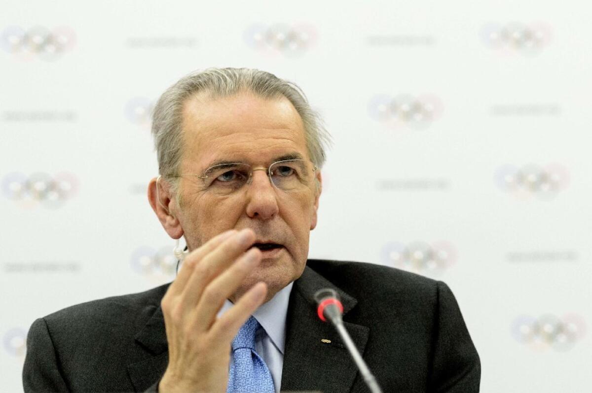 IOC President Jacques Rogge, above, will meet with FILA President Raphael Martinetti to discuss wrestling's place in the Olympics.
