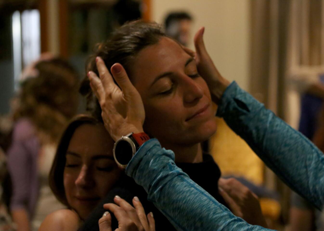 Carly Pepin get a hands-on experience during the Magic of Human Connection playshop at the Conscious Family Dinner event in North Hollywood on Oct. 26, 2016.