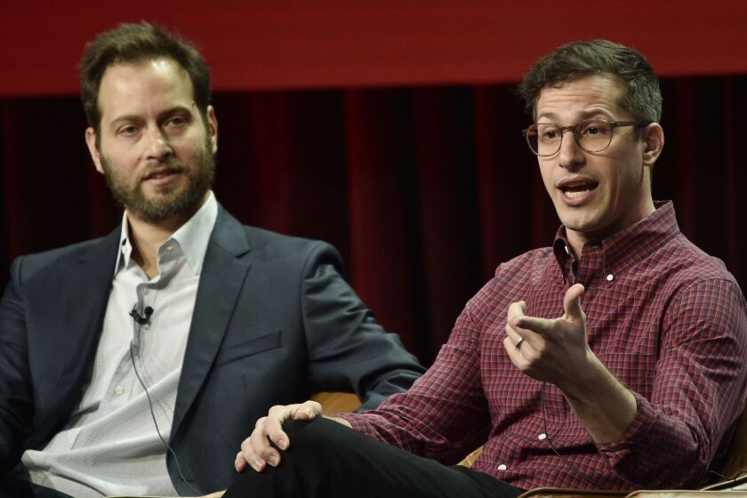 Andy Samberg, right, a cast member in the NBC Universal television series "Brooklyn Nine-Nine," answers a reporter's question as executive producer Dan Goor looks on during the 2018 Television Critics Association Summer Press Tour, Wednesday, Aug. 8, 2018, in Beverly Hills, Calif. (Photo by Chris Pizzello/Invision/AP)