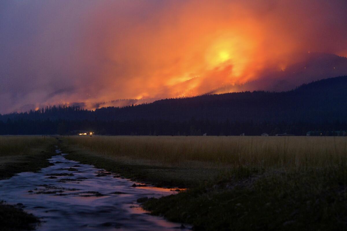 The Rice Ridge Fire burns near Seeley Lake, Mont.